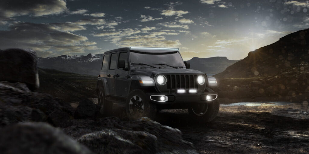 Truck with HELLA X-Treme Series LED Driving Lights in white mode, X-shape position light, IP69K rated, bumper and roof rack mounted for off-road auxiliary high-beam