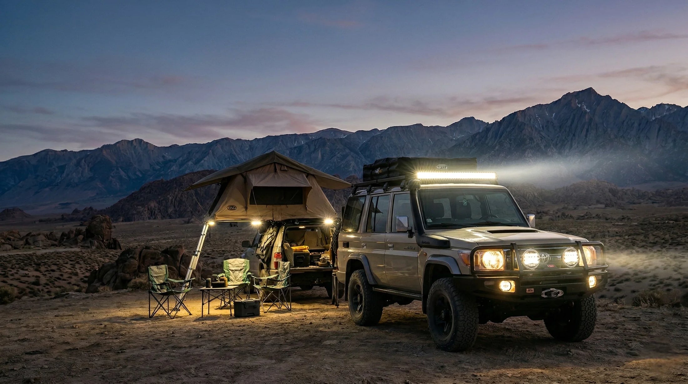 Truck roof rack mounted HELLA X-Treme Series LED Driving Lights in white mode with auxiliary high-beam, IP69K rated for off-road camping adventure