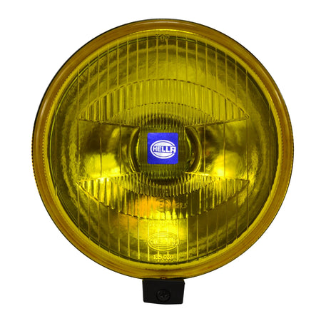 HELLA X-Treme Series LED Driving Lights in Amber mode, auxiliary high-beam, IP69K, X-shape position light, rugged aluminum housing, off-road ready.