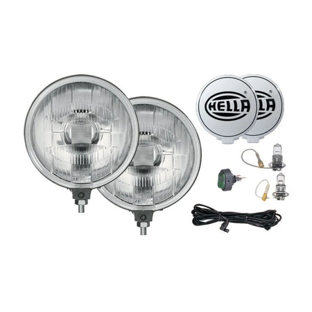 HELLA X-Treme Series LED Driving Lights in white mode with X-shape position light, IP69K, rugged aluminum housing, auxiliary high-beam for off-road.