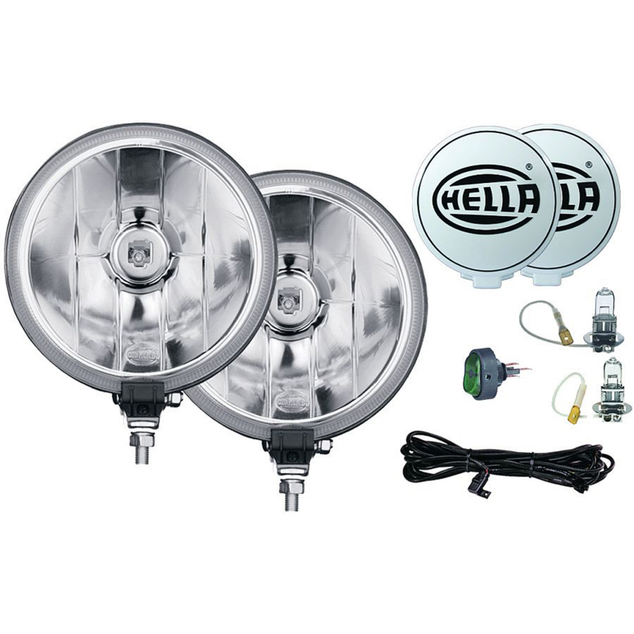 Pair of round, silver HELLA 700 Series halogen spot lights with white covers and wiring kit.