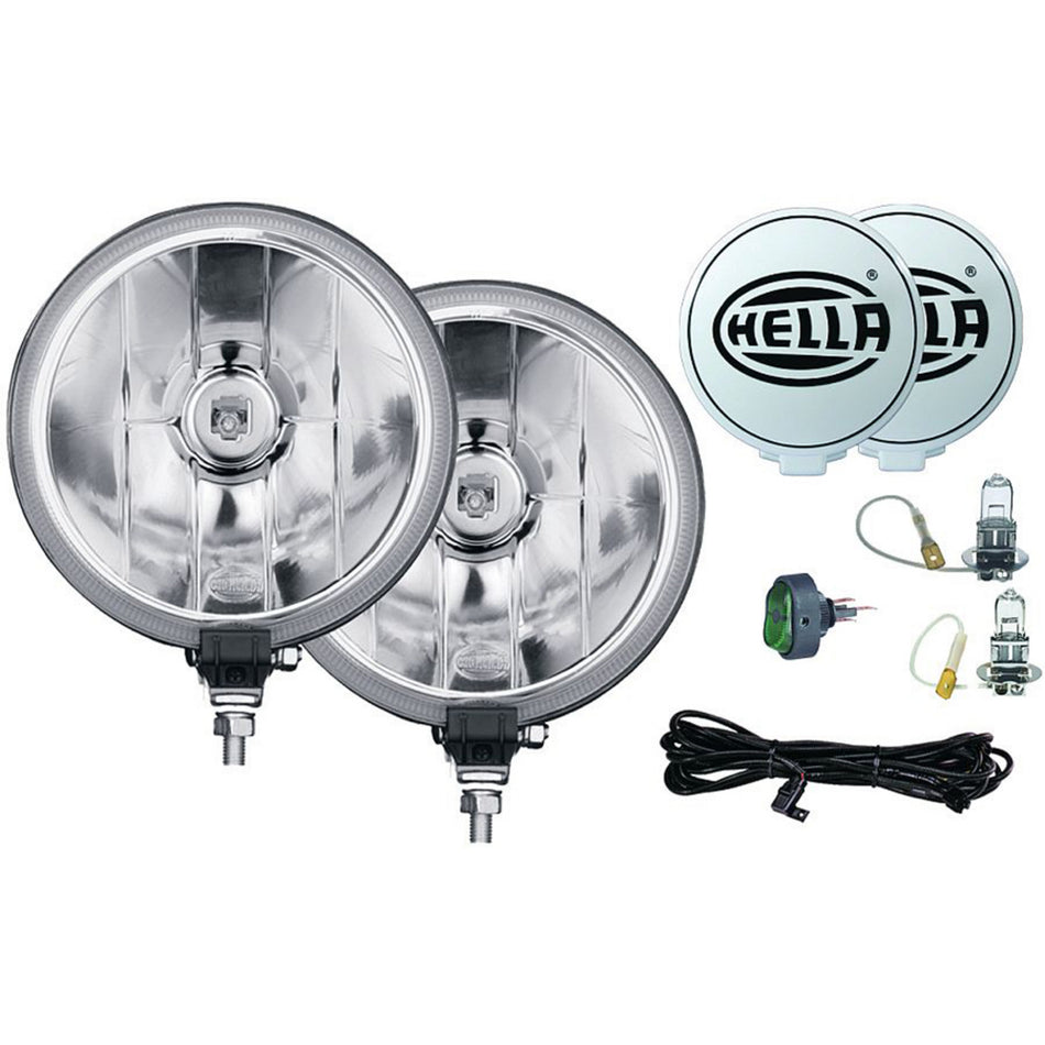 Pair of round, silver HELLA 700 Series halogen spot lights with white covers and wiring kit.