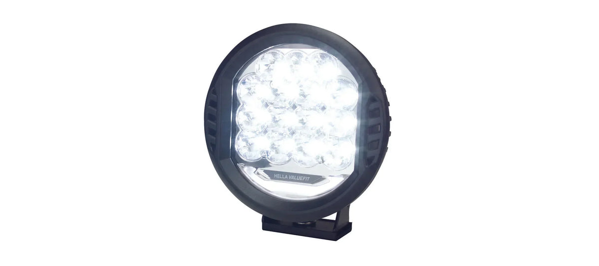 HELLA X-Treme Series LED Driving Lights in white mode with IP69K, X-shape position light, rugged aluminum housing, auxiliary high-beam for off-road