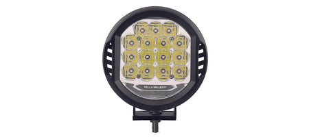 HELLA X-Treme Series LED Driving Lights in white mode with X-shape position light, rugged aluminum housing, IP69K rated, auxiliary high-beam, off-road ready.
