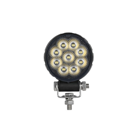 HELLA X-Treme Series LED Driving Light in white mode, rugged aluminum housing, IP69K, auxiliary high-beam for off-road, X-shape position light visible.