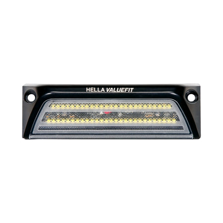 HELLA X-Treme Series LED Driving Lights in white mode with X-shape position light, IP69K, rugged aluminum housing, auxiliary high-beam, off-road ready.