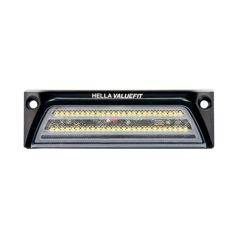 HELLA X-Treme Series LED Driving Lights in white mode with X-shape position light, IP69K, rugged aluminum housing, auxiliary high-beam, off-road ready.