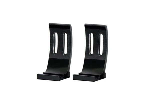 Pair of rugged black aluminum HELLA X-Treme Series off-road LED driving light brackets.