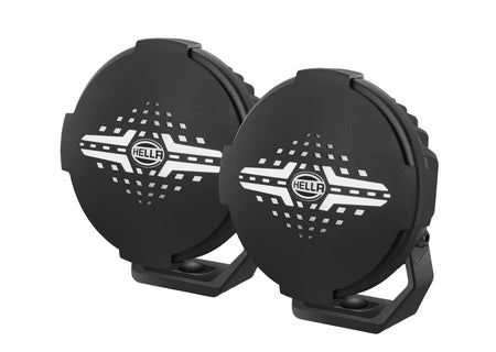 HELLA X-Treme Series LED Driving Lights in rugged aluminum housing with IP69K rating, X-shape position light, white mode, auxiliary high-beam, off-road ready.