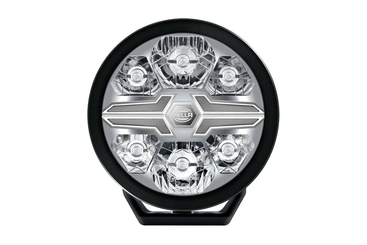 HELLA X-Treme Series LED Driving Lights, white X-shape position light, IP69K, rugged aluminum housing, auxiliary high-beam, off-road ready.