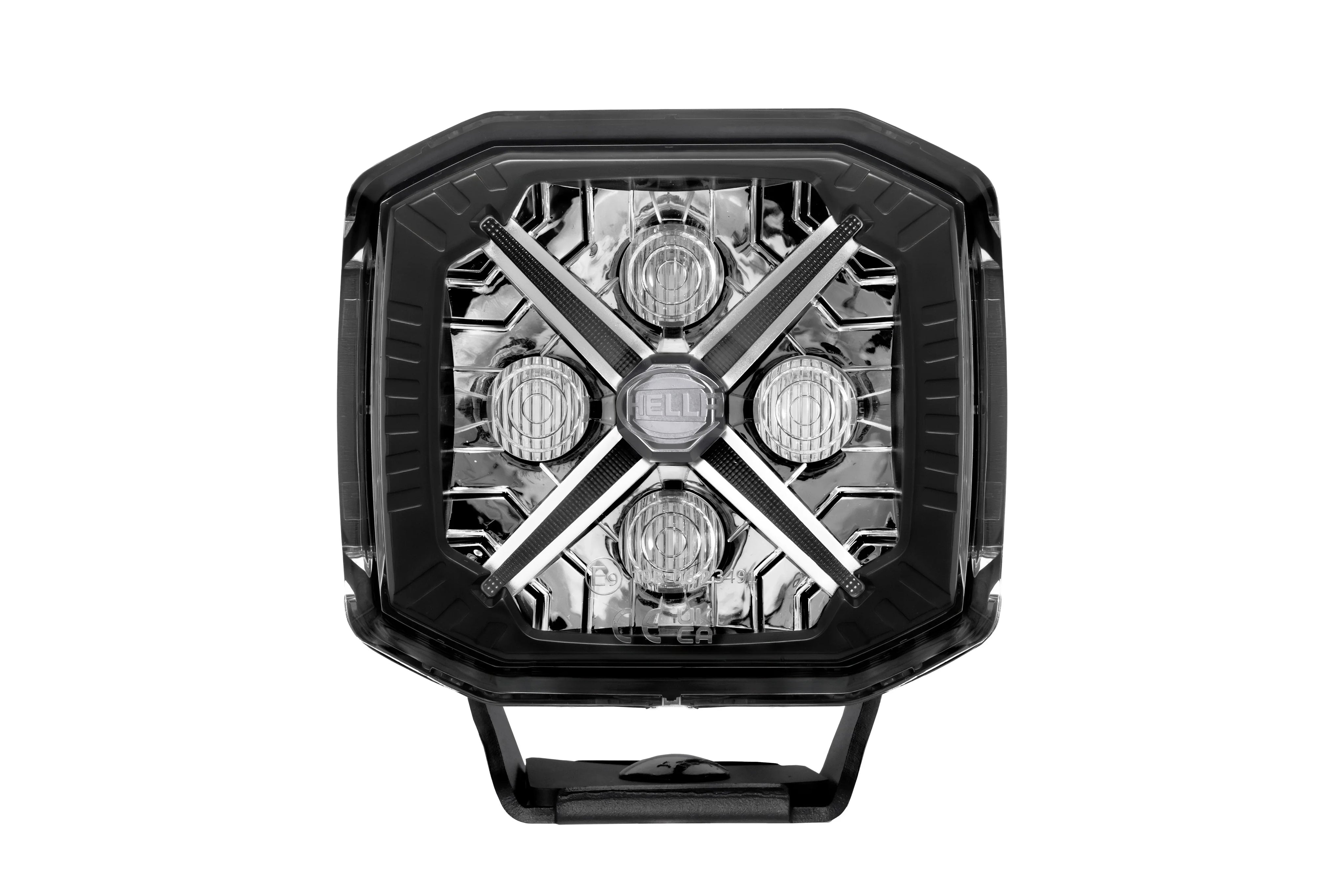 HELLA X-Treme Series LED Driving Lights in IP69K rugged aluminum housing, X-shape position light, white mode, auxiliary high-beam, off-road ready.
