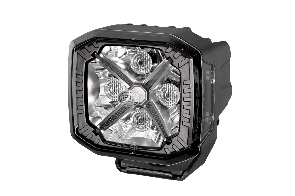 HELLA X-Treme Series LED Driving Lights in white mode, X-shape position light, rugged aluminum housing, IP69K, auxiliary high-beam, off-road.