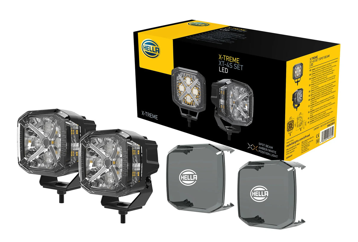 HELLA X-Treme Series LED Driving Lights set in white mode, X-shape position light, IP69K, auxiliary high-beam, rugged aluminum housing.