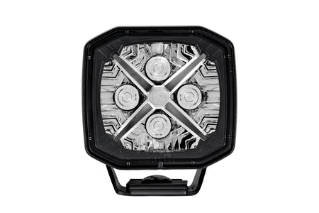 HELLA X-Treme Series LED Driving Lights in white mode, clear lens, X-shape position light, rugged aluminum build, IP69K rated, auxiliary high-beam for off-road