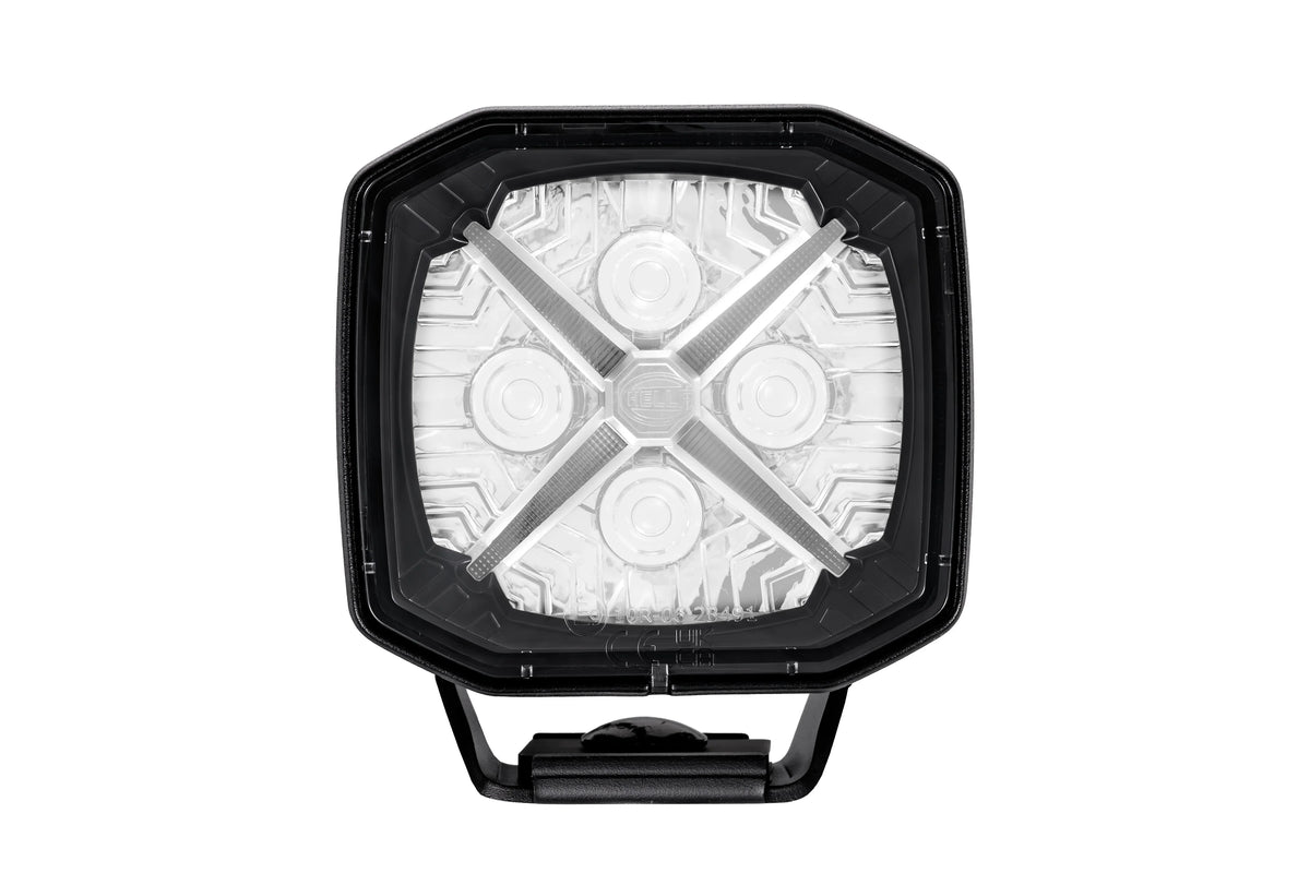 HELLA X-Treme Series LED Driving Light with white X-shape position light, IP69K, rugged housing, auxiliary high-beam, off-road