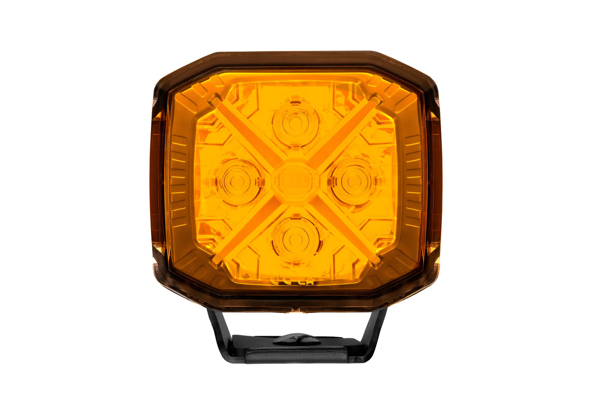 HELLA X-Treme Series LED Driving Lights in amber mode, X-shape position light, IP69K, rugged housing, auxiliary high-beam, off-road