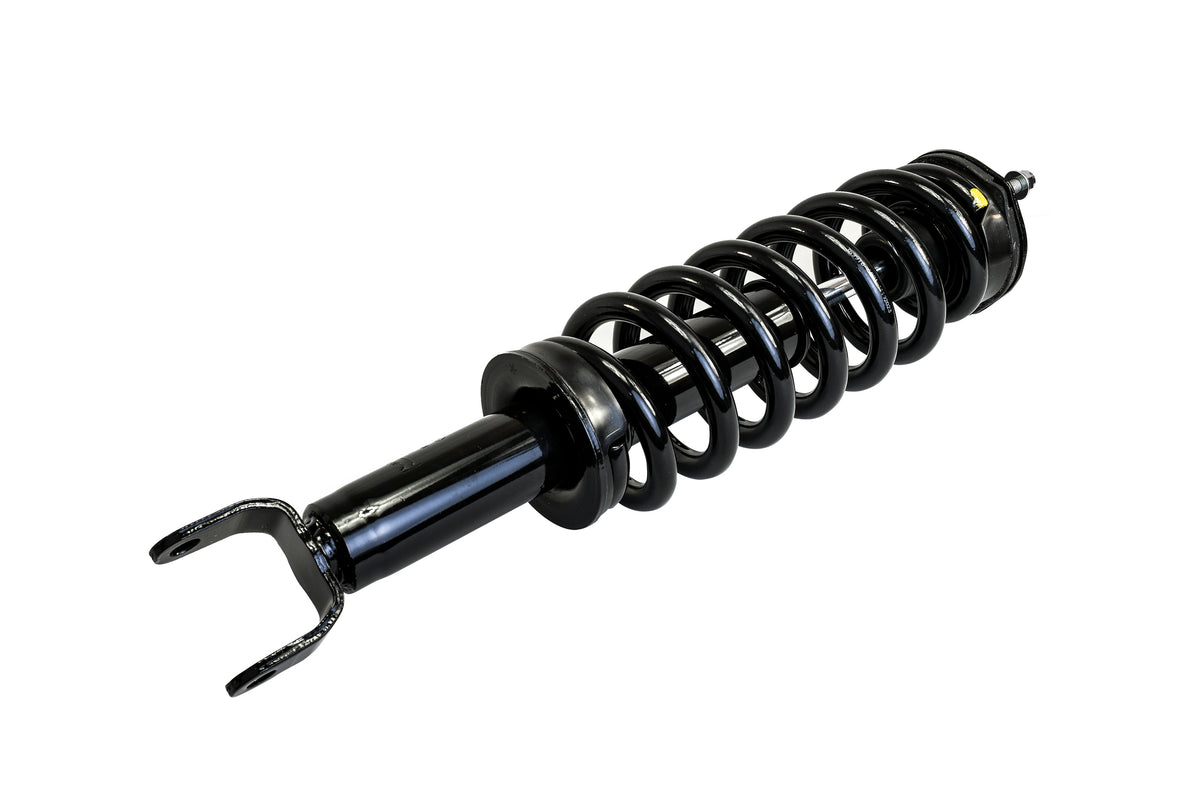 Glossy black Hella Performance 2" leveling strut with coil spring for RAM 1500.