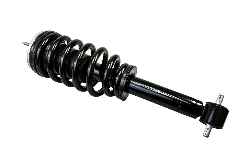 Automotive shock absorber with coil spring, black finish, rugged steel construction, close-up product shot