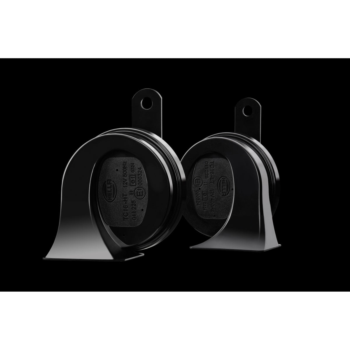 Two black HELLA TE20 trumpet electric twin-tone horns with glossy ABS plastic housing and metal brackets.