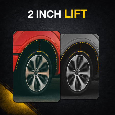 Red and gray Toyota Tundra trucks showing a 2-inch front leveling lift for larger tires.