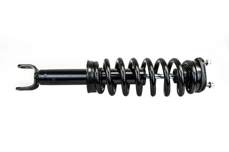 HELLA Performance 2" Leveling Strut for RAM 1500 (2019+) — left side view of black coilover shock with coil spring