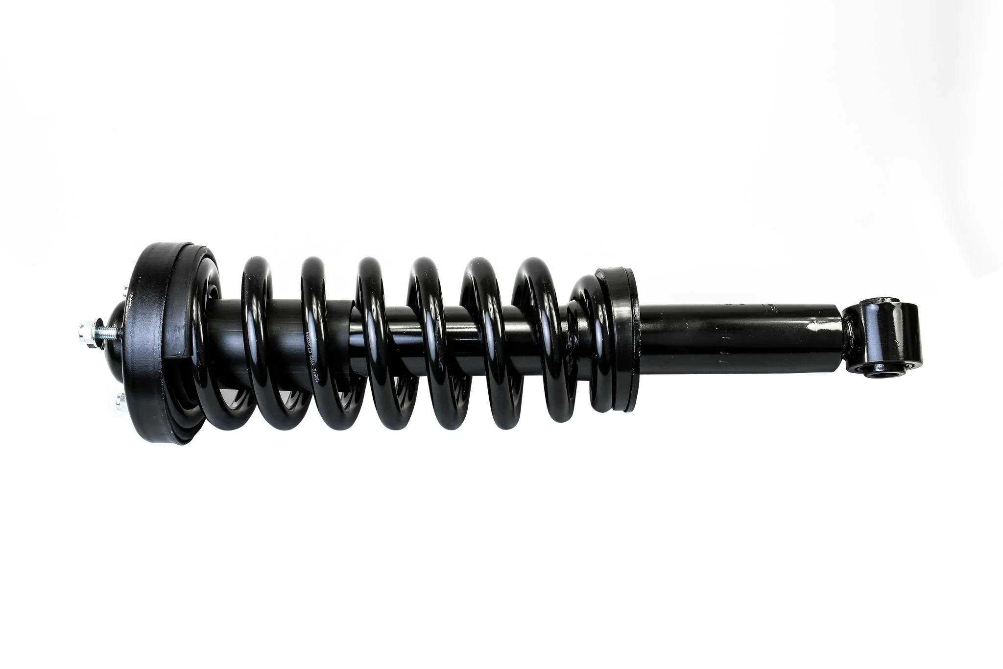 HELLA Performance 2" Leveling Strut for Ford F-150 4WD (2009-2013) — left view of black coilover shock with steel coil spring