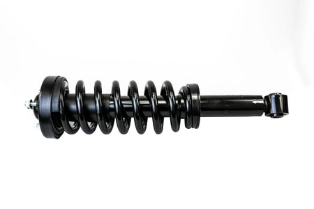 HELLA Performance 2" Leveling Strut for Ford F-150 4WD (2009-2013) — left view of black coilover shock with steel coil spring