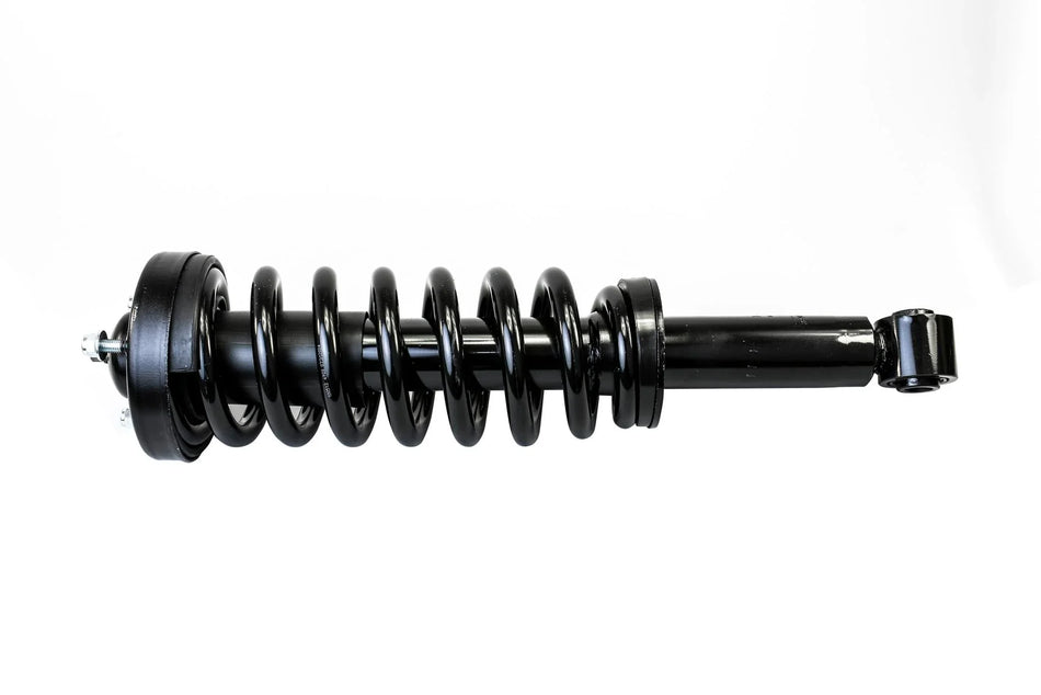 Heavy-duty automotive coilover shock absorber with durable black steel spring and mounting hardware