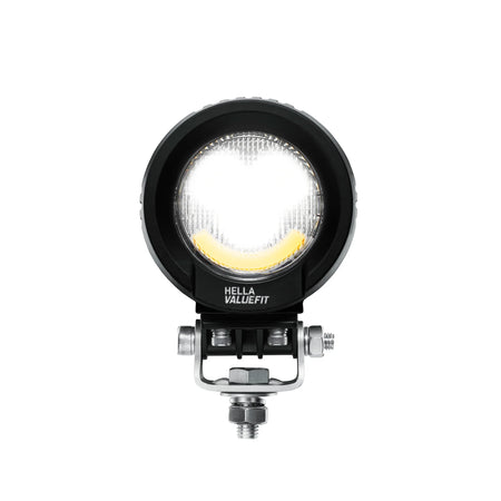HELLA X-Treme Series IP69K LED Driving Lights in white mode, X-shape position light, rugged housing, auxiliary high-beam for off-road use.