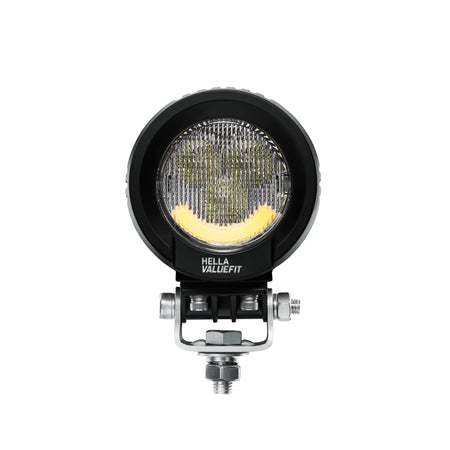 HELLA X-Treme Series LED Driving Lights in amber mode, X-shape position light, rugged aluminum housing, IP69K auxiliary high-beam for off-road