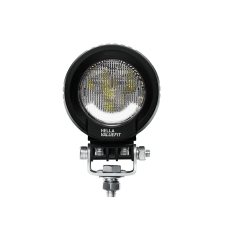 HELLA X-Treme Series LED Driving Lights in white mode with X-shape position light, rugged aluminum housing, IP69K, auxiliary high-beam for off-road.